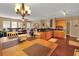 Open concept kitchen and dining area with hardwood floors at 5099 Ballantine Dr, Summerville, SC 29485