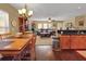 Open kitchen with granite countertops, stainless steel appliances, and hardwood floors at 5099 Ballantine Dr, Summerville, SC 29485