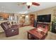 Open living area, leather sofas, and access to kitchen at 5099 Ballantine Dr, Summerville, SC 29485