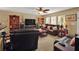 Comfortable living room, leather furniture, built-in shelving at 5099 Ballantine Dr, Summerville, SC 29485