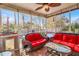 Relaxing screened porch overlooking the backyard; view of the pool at 5099 Ballantine Dr, Summerville, SC 29485