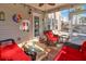 Bright and airy screened porch with comfortable seating and backyard access at 5099 Ballantine Dr, Summerville, SC 29485