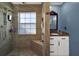 Walk-in shower with tiled walls and built in seat at 5099 Ballantine Dr, Summerville, SC 29485