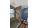 Large walk-in shower with tiled walls and built-in seat at 5099 Ballantine Dr, Summerville, SC 29485