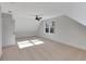 Large bedroom with dormer window and carpet at 5294 Seewee Rd, Awendaw, SC 29429