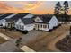 Two-story house with gray siding, white trim, and a two-car garage at 559 Tidewater Chase Ln, Summerville, SC 29486