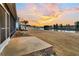 Private backyard with patio and sunset view at 559 Tidewater Chase Ln, Summerville, SC 29486