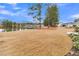 Large backyard with lake views and mature trees at 559 Tidewater Chase Ln, Summerville, SC 29486