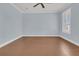 Spacious bedroom with hardwood floors and a large window at 559 Tidewater Chase Ln, Summerville, SC 29486