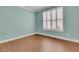 Bedroom with wood floors and window with shutters at 559 Tidewater Chase Ln, Summerville, SC 29486