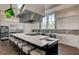 Upscale community kitchen, white cabinets, large island, and modern appliances at 559 Tidewater Chase Ln, Summerville, SC 29486