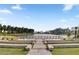 Scenic community lake with a wooden deck and seating at 559 Tidewater Chase Ln, Summerville, SC 29486