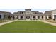 Expansive community lawn with a building in the background at 559 Tidewater Chase Ln, Summerville, SC 29486