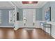 Light-filled entryway, hardwood floors, and white trim at 559 Tidewater Chase Ln, Summerville, SC 29486