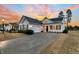 Two-story house with gray siding, white trim, and a two-car garage at 559 Tidewater Chase Ln, Summerville, SC 29486