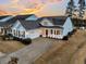 Two-story house with gray siding, white trim, and a two-car garage at 559 Tidewater Chase Ln, Summerville, SC 29486