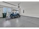 Spacious garage with epoxy flooring and room for golf cart at 559 Tidewater Chase Ln, Summerville, SC 29486
