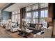 Comfortable lounge with seating and large windows at 559 Tidewater Chase Ln, Summerville, SC 29486