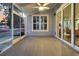 Enjoy the screened porch overlooking the backyard at 559 Tidewater Chase Ln, Summerville, SC 29486