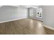 Spacious unfinished basement with light gray walls and wood flooring at 7228 Mossy Creek Ln, Hanahan, SC 29410