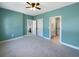Spacious bedroom with green walls, carpet, and ensuite bathroom access at 7228 Mossy Creek Ln, Hanahan, SC 29410