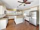 Modern kitchen with white cabinets, granite countertops, and stainless steel appliances at 7228 Mossy Creek Ln, Hanahan, SC 29410