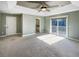 Main bedroom with en-suite bathroom and access to a deck at 7228 Mossy Creek Ln, Hanahan, SC 29410