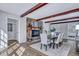 Spacious dining area with a stone fireplace and hardwood floors at 1 Hunters Forest Dr, Charleston, SC 29414