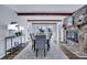 Elegant dining room with stone fireplace and hardwood floors at 1 Hunters Forest Dr, Charleston, SC 29414