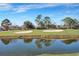 Golf course with pond and sand traps at 1 Hunters Forest Dr, Charleston, SC 29414