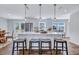 Modern kitchen island with seating and white cabinets at 1 Hunters Forest Dr, Charleston, SC 29414