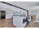 Modern kitchen with white cabinetry and a large island at 1 Hunters Forest Dr, Charleston, SC 29414