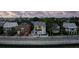 Modern home on a tree-lined street with city views at 100 Murray Blvd, Charleston, SC 29401