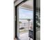 Private balcony with waterfront views and outdoor seating at 100 Murray Blvd, Charleston, SC 29401