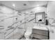 Modern bathroom with marble tile and frameless shower at 100 Murray Blvd, Charleston, SC 29401
