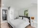 Bright bedroom with ensuite bathroom and water views at 100 Murray Blvd, Charleston, SC 29401