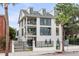Three-story home with modern design and gated entrance at 100 Murray Blvd, Charleston, SC 29401