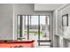Game room with pool table and sliding doors to backyard at 100 Murray Blvd, Charleston, SC 29401