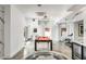 Basement game room with pool table, home gym, and wet bar at 100 Murray Blvd, Charleston, SC 29401
