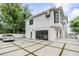 Modern two-car garage with glass door and plenty of space at 100 Murray Blvd, Charleston, SC 29401