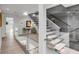 Bright hallway with a modern glass railing overlooking the lower level at 100 Murray Blvd, Charleston, SC 29401