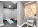 Basement home gym with yoga mat and weights at 100 Murray Blvd, Charleston, SC 29401