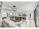 Open concept kitchen with island, white cabinets, and water views at 100 Murray Blvd, Charleston, SC 29401