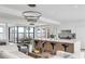 Modern kitchen features island, white cabinets and water views at 100 Murray Blvd, Charleston, SC 29401