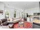 Cozy living room with kitchenette and ornate rug at 100 Murray Blvd, Charleston, SC 29401