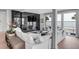 Modern living room with a marble fireplace and water views at 100 Murray Blvd, Charleston, SC 29401