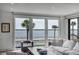Living room with amazing water views and comfy seating at 100 Murray Blvd, Charleston, SC 29401