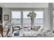 Living room features stunning water views and comfy seating area at 100 Murray Blvd, Charleston, SC 29401