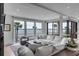 Spacious living room boasts water views and ample natural light at 100 Murray Blvd, Charleston, SC 29401