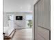 Main bedroom with water views and marble accent wall at 100 Murray Blvd, Charleston, SC 29401